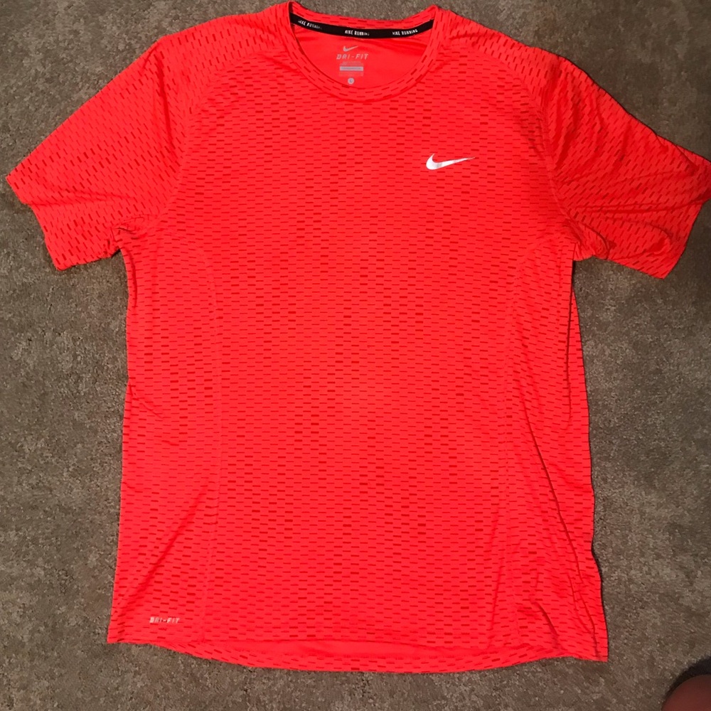 Orange Nike shirt